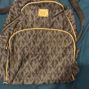Michael Kors Monogram Black and Tan Backpack